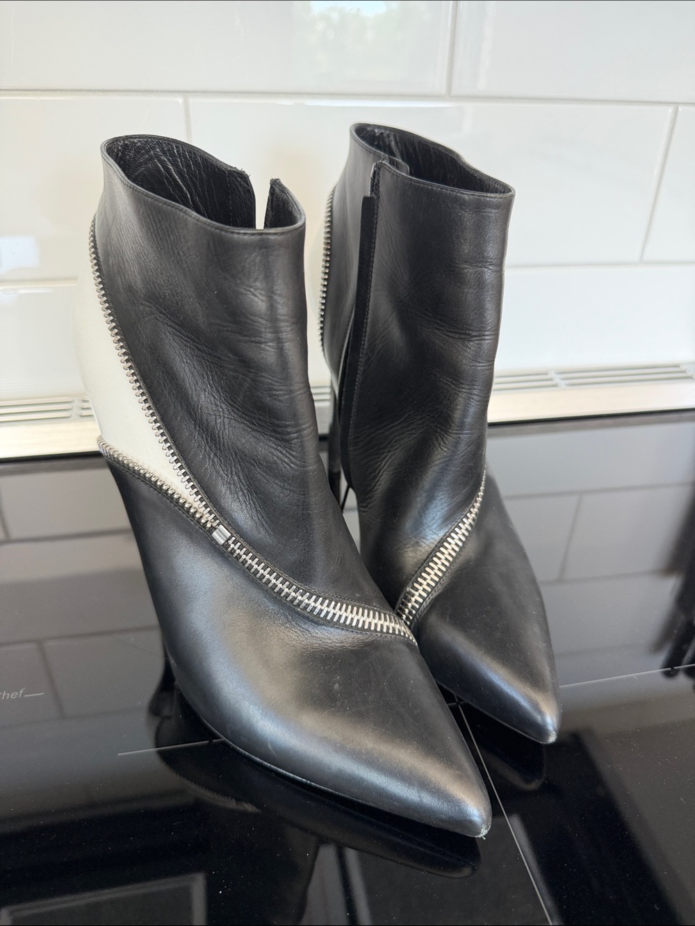 Black and White Leather Pointed-Zip Ankle Boots